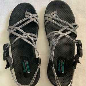 Sketchers sandals. Size 9~ Black/white striped. Good condition.